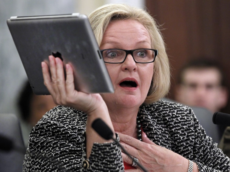File Photo: Sen. Claire McCaskill, D-Mo., holds up her Apple IPad during a hearing of the Subcommittee on Consumer Protection, Product Safety, and Insurance on cell phone privacy on Capitol Hill Thursday, May 19, 2011 in Washington. (Photo by Alex...