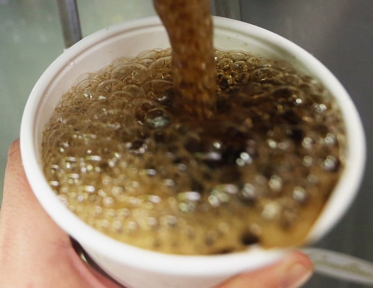 File Photo: A 32-ounce soda is filled at a Manhattan McDonalds on September 13, 2012 in New York City. In an effort to combat obesity, the New York City Board of Health voted to ban the sale of large sugary drinks. The controversial measure bars the...