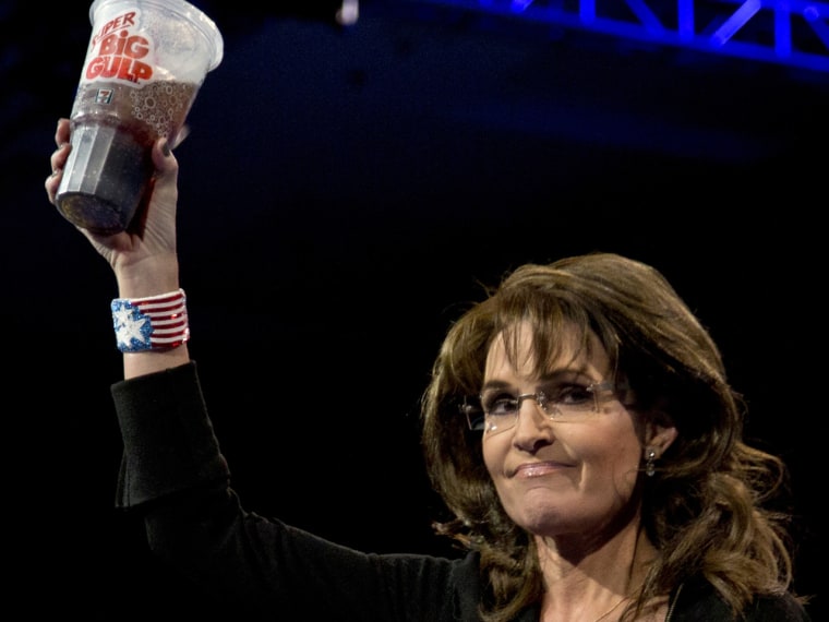 Former Alaska Gov. Sarah Palin holds up a 7-Eleven Super Big Gulp soda on stage at the 40th annual Conservative Political Action Conference in National Harbor, Md., Saturday, March 16, 2013. Earlier in the week a New York judge struck down a ban...