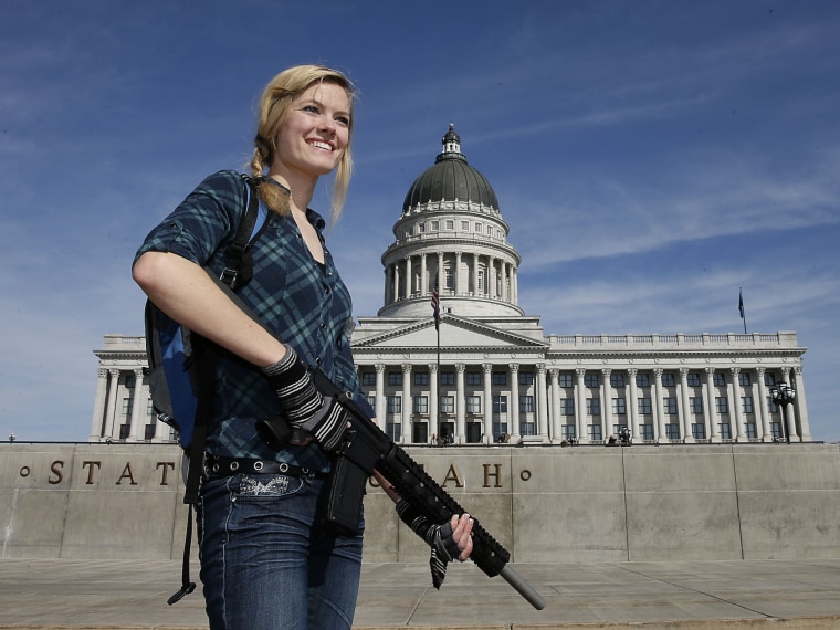 Darci Lund carries an AR-15 at a gun rights rally and march at the Utah State Capitol on March 2, 2013 in Salt Lake City, Utah. The rally attracted several hundred people for the march to the Utah Capitol in favor of 2nd Amendment rights as gun control...