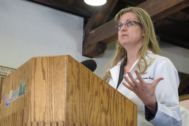 Dr. Stephanie Dahl, a Fargo infertility specialist, speaks out against two anti-abortion bills in the North Dakota Legislature during a news conference Monday, March 18, 2013, in Fargo, N.D. Dahl says the bills could restrict or ban in vitro...