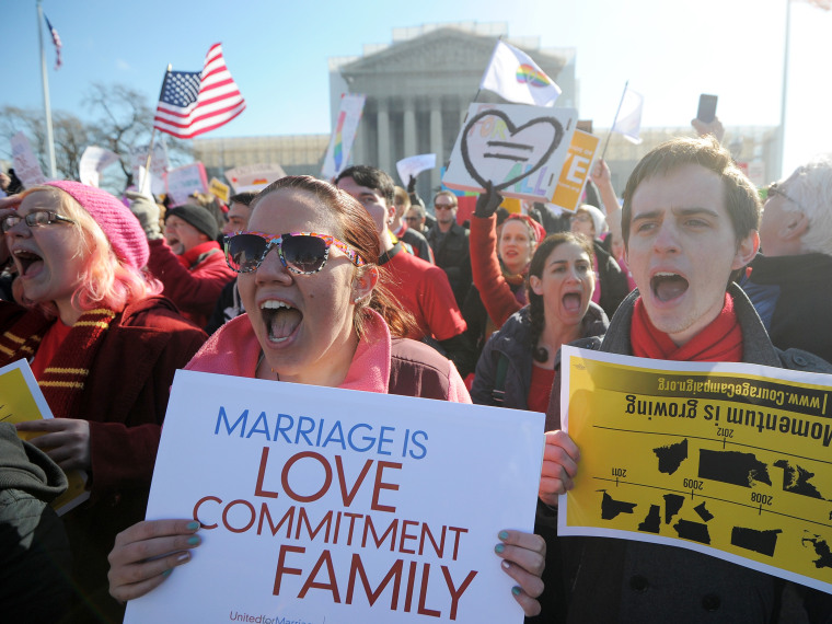 Same-sex marriage supporters shout slogans in front of the US Supreme Court on March 26, 2013 in Washington, DC. (Photo by Jewel Samad/AFP/Getty Images)