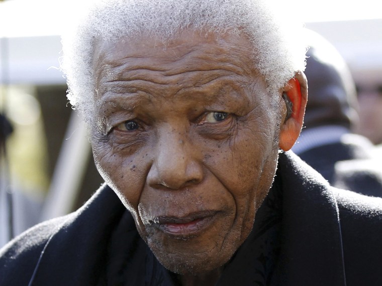 In this June 17, 2010 file photo, former South African President Nelson Mandela leaves the chapel after attending the funeral of his great-granddaughter Zenani Mandela in Johannesburg, South Africa. (Photo by Siphiwe Sibeko/AP Photo, Pool, File)