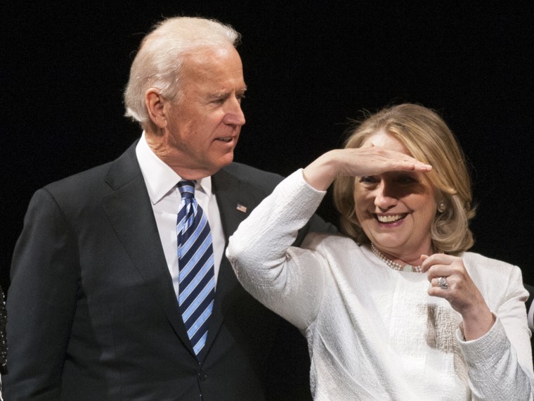 Vice President Joe Biden and former Secretary of State Hillary Rodham Clinton appear onstage at the Vital Voices Global Partnership 2013 Global Leadership Awards gala at the Kennedy Center for the Performing Arts in Washington, Tuesday, April 2, 2013. ...