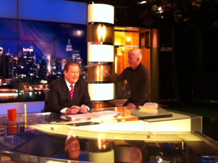 Segment Producer Carey Fox throws a marshmallow at Ed's head to create the special effect seen on tonight's show.
