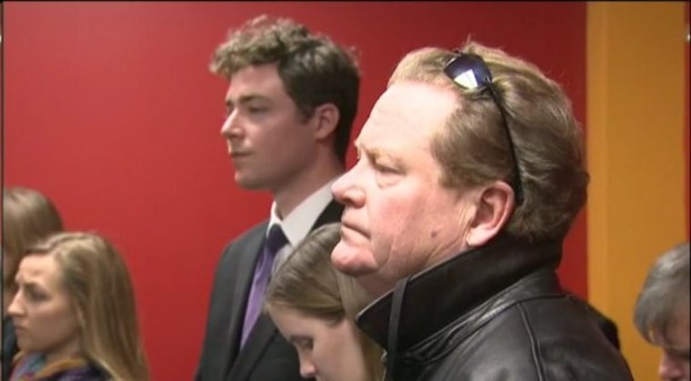 Ed listens to Ron Paul address supporters at a campaign event today in Newton, Iowa.