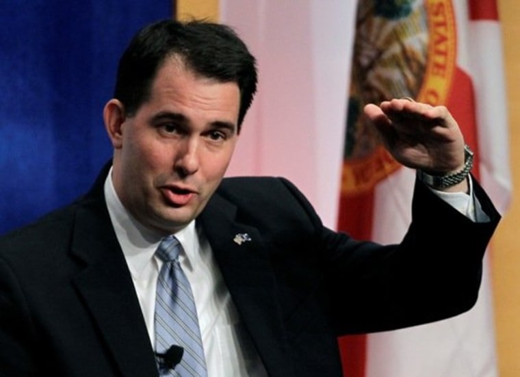 Wisconsin Gov. Scott Walker makes comments during a plenary session at the Republican Governors Association annual conference, Thursday, Dec. 1, 2011, in Orlando, Fla.