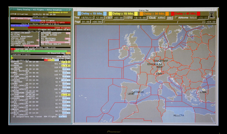 A display screen shows the no fly zone, in blue, of Libya on a screen at Eurocontrol in Brussels. Libya has closed its air space to all traffic.