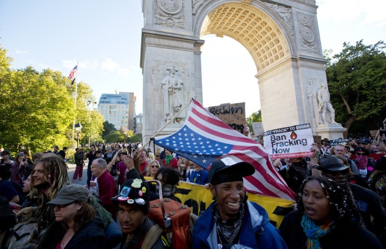 Occupy Wall Street protesters leave Washington Square Park at the start of their Saturday march to Zuccotti Park, the first planned march as part of three days of events to mark the one year anniversary of the movement.