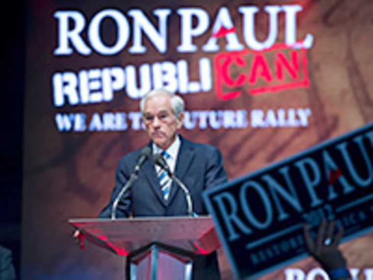 Rep. Ron Paul addresses a crowd of supporters in Tampa before the start of the Republican National Convention.