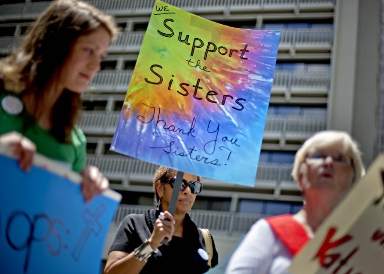 Princess Wilson, center, joins a demonstration in support of U.S. Catholic nuns outside the U.S. Conference of Catholic Bishops' biannual meeting on June 13, 2012, in Atlanta.