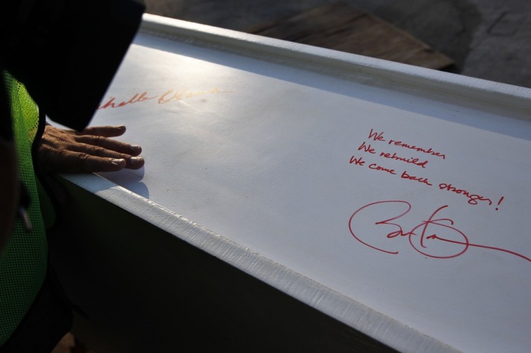 Beam signed by Obama installed at One World Trade Center