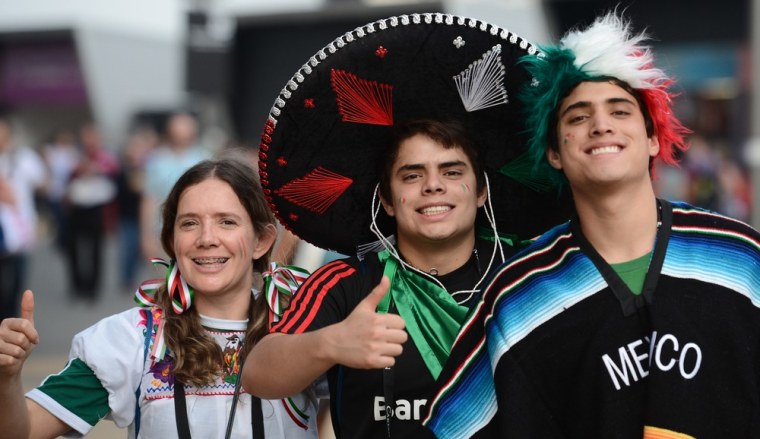 Mexican fans arrive at Olympic Park before the opening ceremony on July 27.