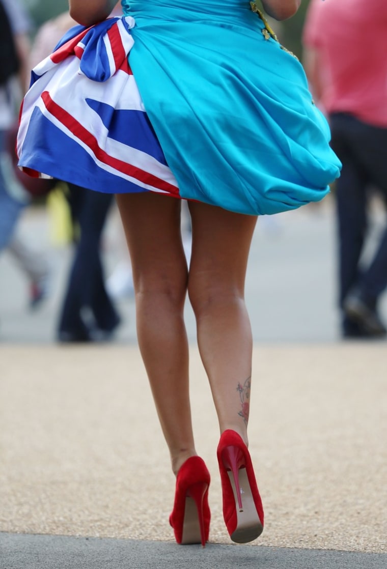A fan wears a dress displaying a Union Jack outside Olympic Stadium before opening ceremonies on July 27.
