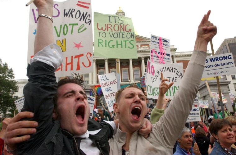 Greg Kimball and Brian O'Connor shout outside the Massachusetts State House on June 14, 2007 in Boston, Mass. On May 31, 2012, the U.S. Circuit Court of Appeals in Boston ruled that the Defense of Marriage Act (DOMA) unconstitutionally denies married...