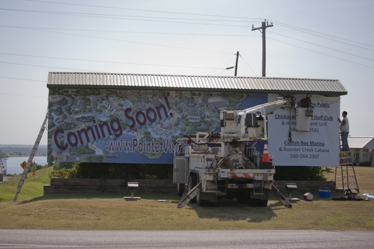 A banner announcing the Pointe Vista development at Lake Texoma State Park in Oklahoma is hung in July 2009.