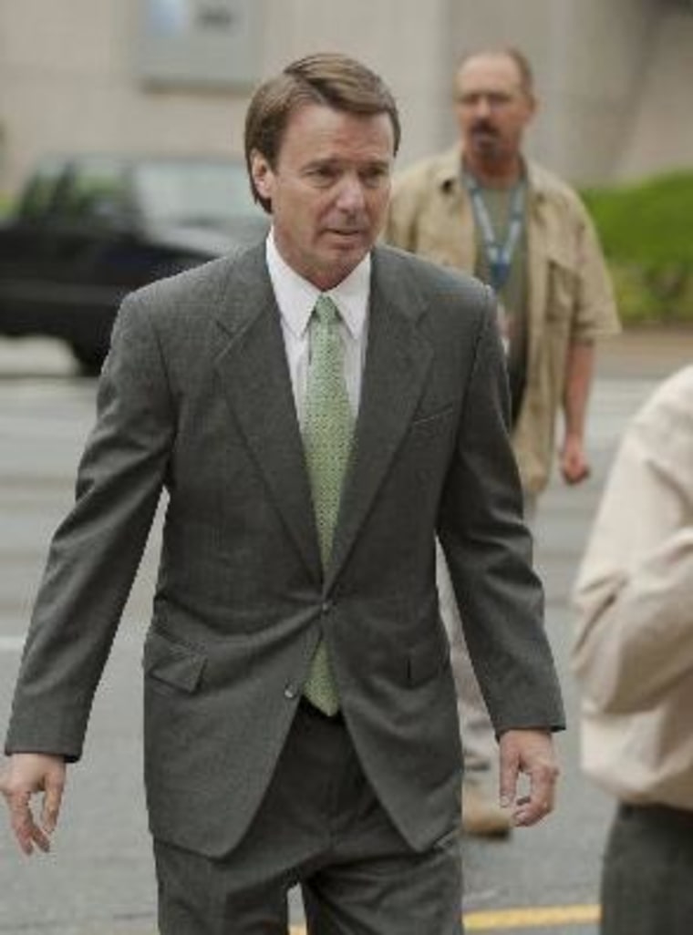 Former U.S. Senator John Edwards walks with his father Wallace Edwards to the federal courthouse in Greensboro, May 14, 2012.