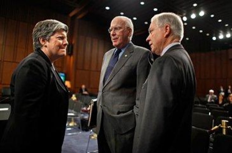 DHS Secretary Janet Napolitano talks with Senate Judiciary Committee Chairman Patrick Leahy (D) and Sen. Jeff Sessions (R).