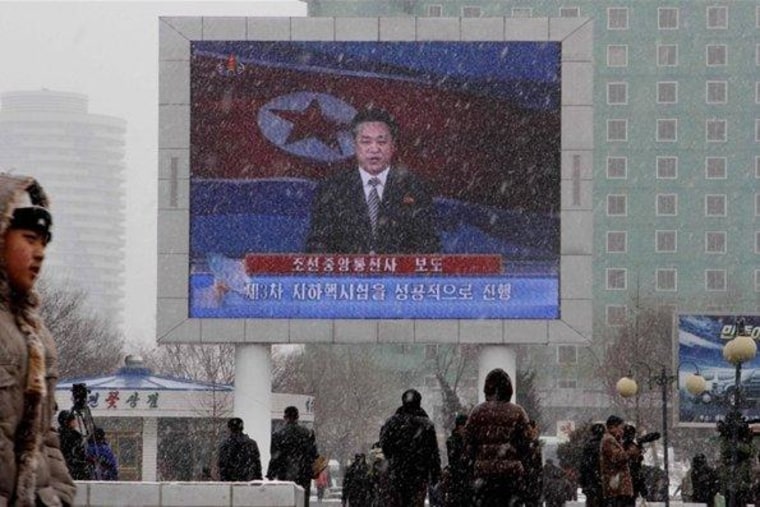 On a large television screen in front of Pyongyang's railway station, a North Korean state television broadcaster announces Tuesday that North Korea has conducted a nuclear bomb test.