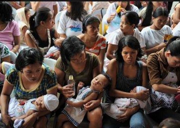 Women in the Philippines wait for check-ups during a medical mission organized by UNFPA.