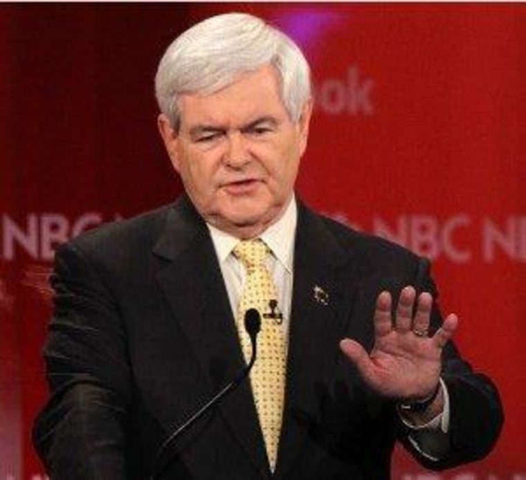 Gingrich lays off staffers, scales back campaign