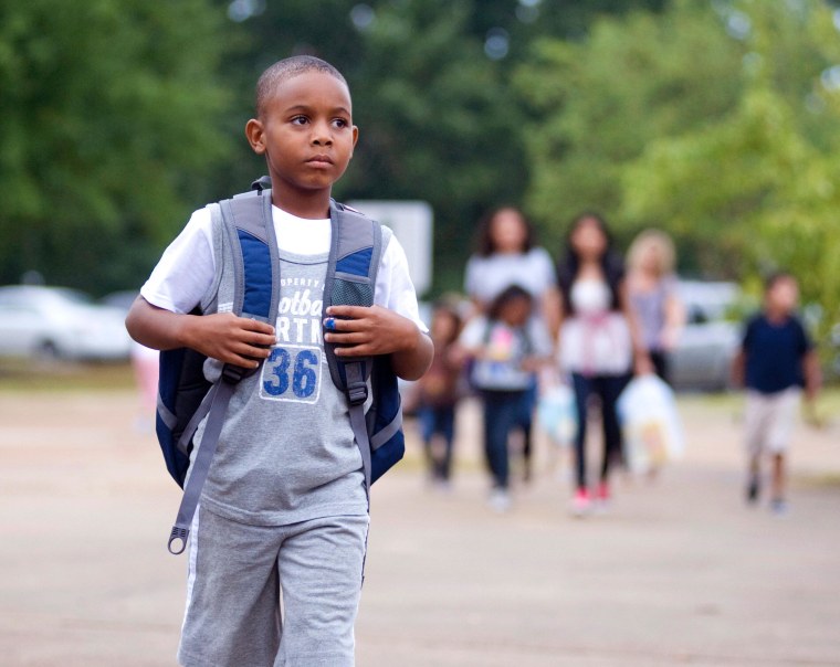 Earlier this month, Oxford (Miss.) Elementary student Jabari Turner walks into school for the start of the new school year.