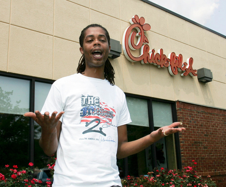 Yes, that's Antoine Dodson, in front of Chick-fil-A, on \"Chick-fil-A Appreciation Day,\" wearing a t-shirt with Antoine Dodson's name on it. I'll explain this below.