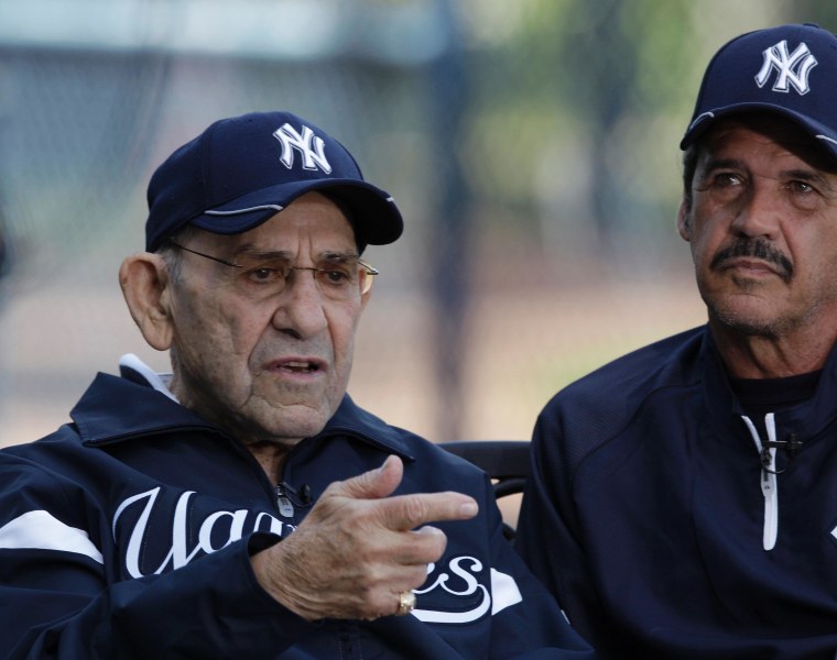 New York Yankees Hall of Fame catcher and special advisor Yogi Berra, left, sits beside former pitcher and spring guest instructor Ron Guidry during an interview before the Yankees spring training baseball game against the Washington Nationals at...