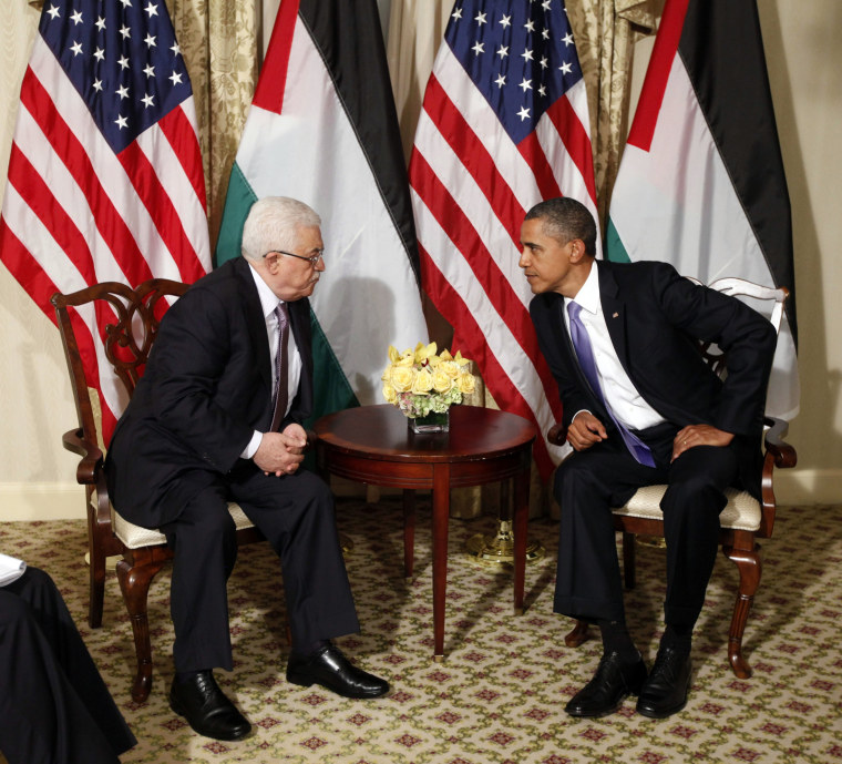 President Barack Obama talks with Palestinian President Mahmoud Abbas during a meeting in New York, Wednesday, Sept., 21, 2011.