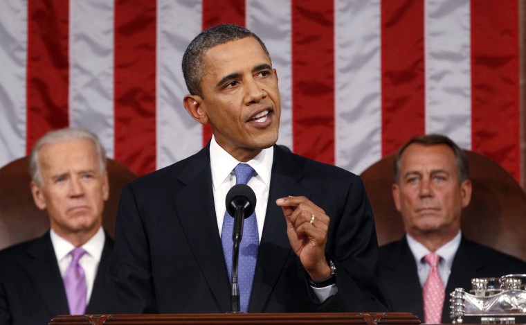 President Barack Obama delivers a speech to a joint session of Congress at the Capitol in Washington, Thursday, Sept. 8, 2011. Watching are Vice President Joe Biden and House Speaker John Boehner.