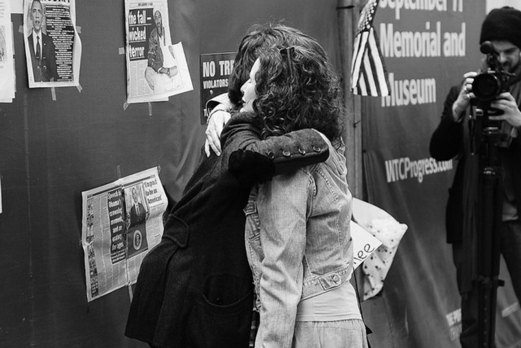 Two people share a hug at the WTC.