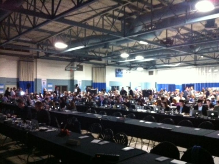 Media from around the world fill the filing center at St. Anselm College in Manchester, NH