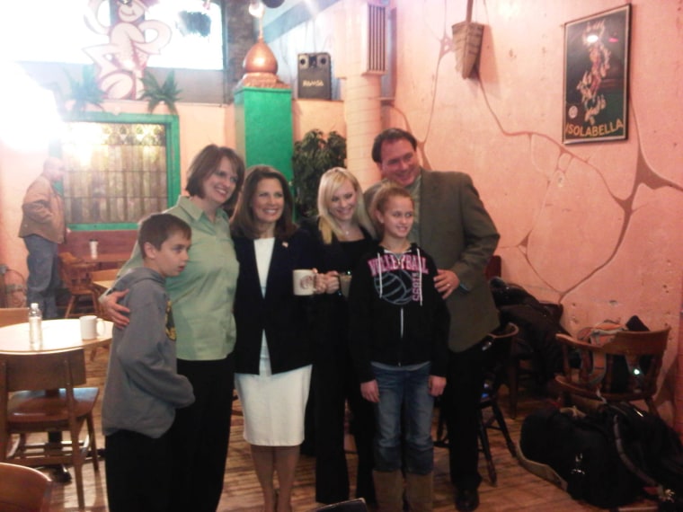 Michele Bachmann poses with the owners of Java Joe's in downtown Des Moines, our interview site