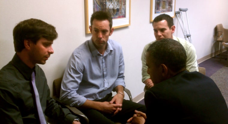 President Obama speaks with family members of shooting victim Jessica Ghawi.