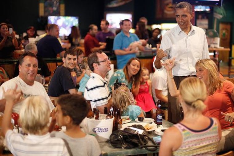 President Obama chatting with seven-year-old Andre Wupperman on Saturday in Orlando, Florida.