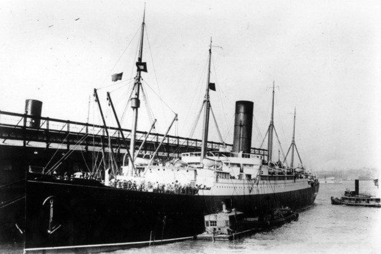 RMS Carpathia docked at Pier 54 in New York following the rescue of Titanic's survivors.