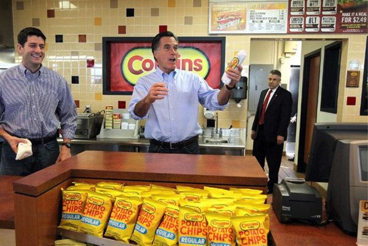 Mitt Romney and Rep. Paul Ryan handing out sandwiches to supporters at Cousins Subs in Waukesha, Wisconsin on Tuesday.