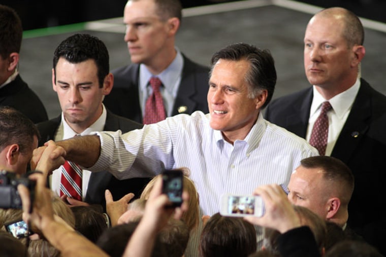 Willard M. Romney shaking hands with supporters in Centennial, Colorado on Monday.