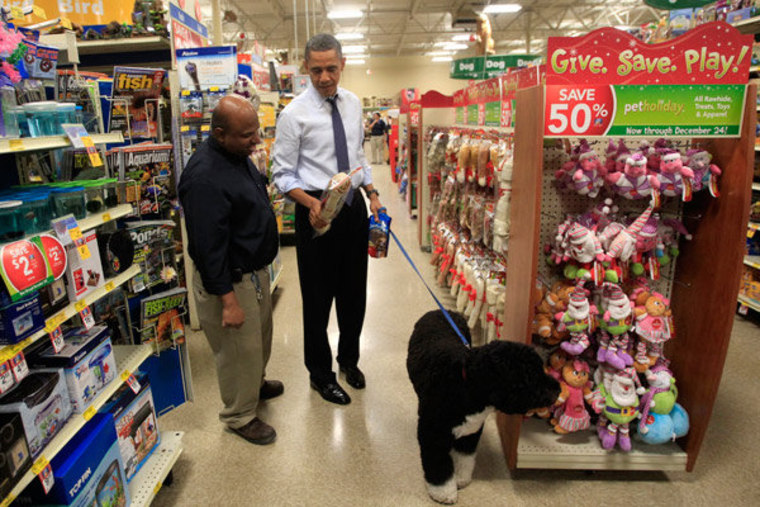 President Obama buying a bone for his dog, Bo, in Alexandria, Virginia on Wednesday.
