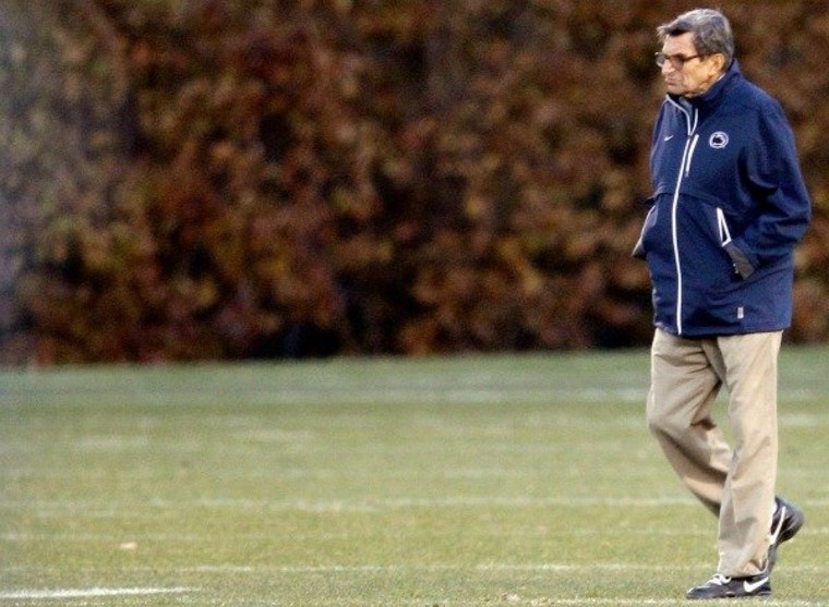 Penn State football coach Joe Paterno watches his team during practice, Nov. 9