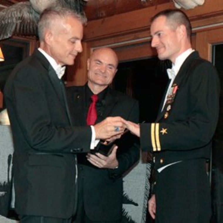 Navy Lt. Gary Ross and Dan Swezy exchange wedding vows in Duxbury, Vermont on Tuesday.