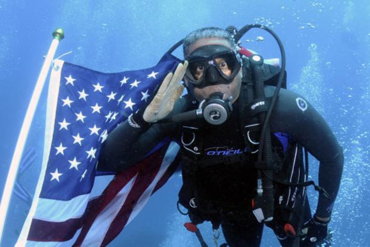 Rep. Allen West scuba diving on Sunday.