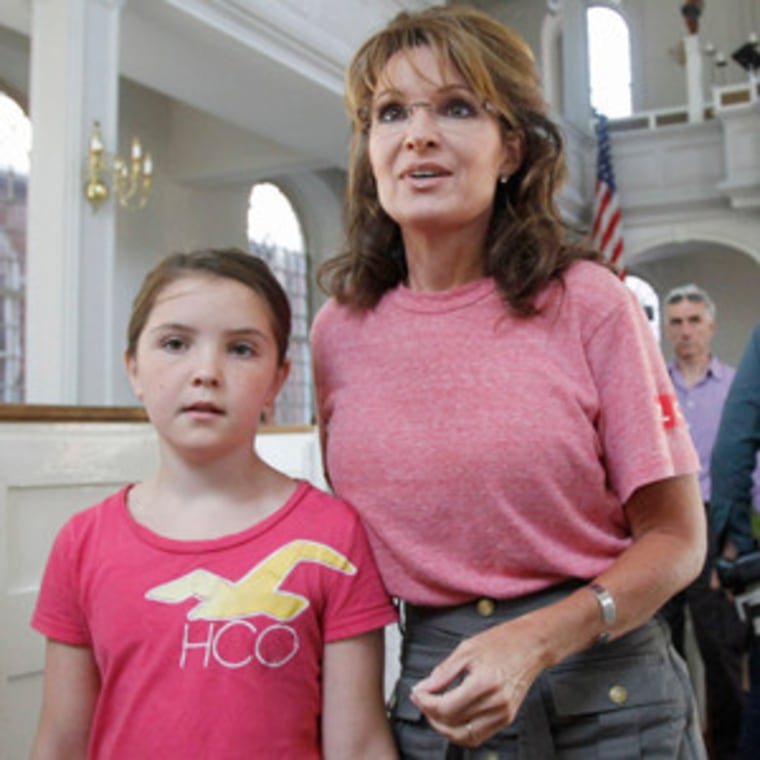 Sarah Palin along with her young daughter Piper.