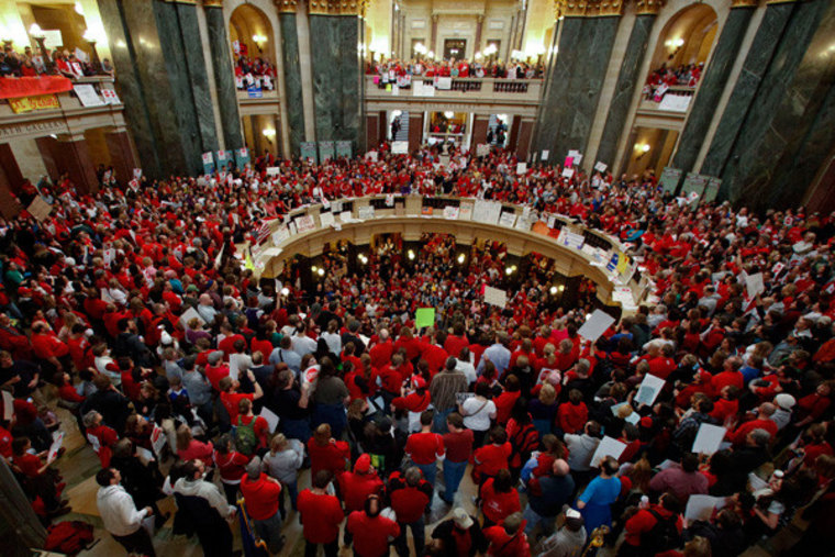 Protesters pack out the State Capitol in Madison, Wisconsin on Thursday, demonstrating against Gov. Scott Walker's bill to eliminate collective bargaining rights for state workers.