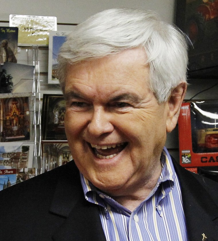 Republican presidential candidate, former House Speaker Newt Gingrich, makes a campaign stop at the National Farm Toy Museum in Dyersville, Iowa, Tuesday, Dec. 27, 2011. (AP Photo/Charles Dharapak)