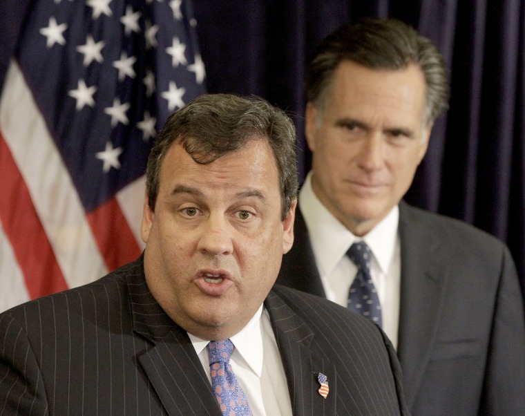 New Jersey Gov. Chris Christie, left, endorses Republican presidential candidate, former Massachusetts Gov. Mitt Romney, right, Tuesday, Oct. 11, 2011, during a news conference in Lebanon, N.H.  (AP Photo/Stephan Savoia)