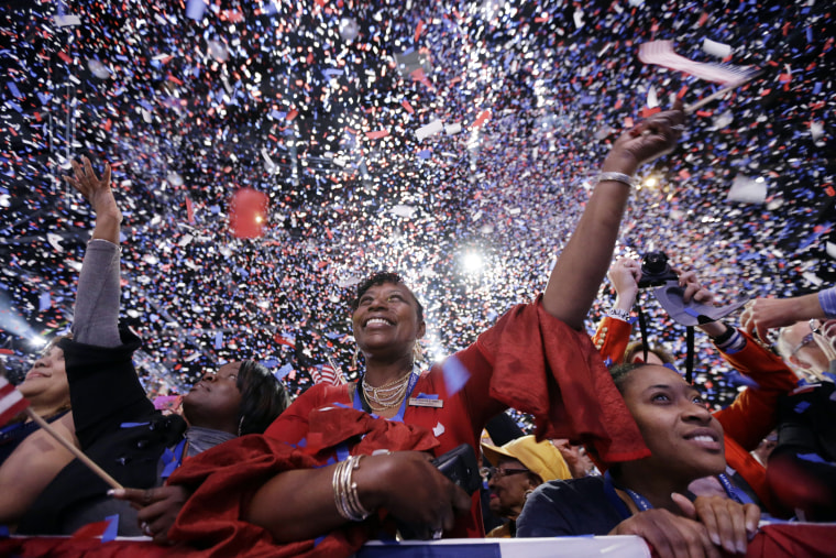 Supporters cheer at the end of President Barack Obama remarks during an election night party, early Wednesday, Nov. 7, 2012, in Chicago. Obama defeated Republican challenger former Massachusetts Gov. Mitt Romney. (Photo by Matt Rourke/AP)