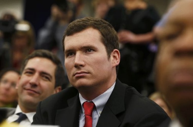 Virginia Tech shooting survivor Colin Goddard attends a White House event during which U.S. President Barack Obama unveiled a series of gun violence proposals at the White