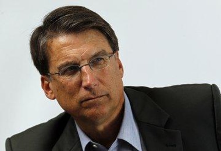 NC's McCrory lauds voter-suppression bill he hasn't read