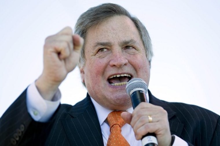 Political commentator Dick Morris speaks to a crowd in this Sept.  12, 2010 file photo. (Photo by Whitney Curtis/AP)